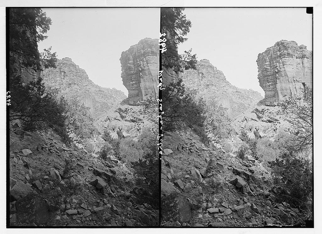 Petra (Wadi Musa). Es-Siyyagh Valley. Perpendicular cliffs. Looking toward the Araba
